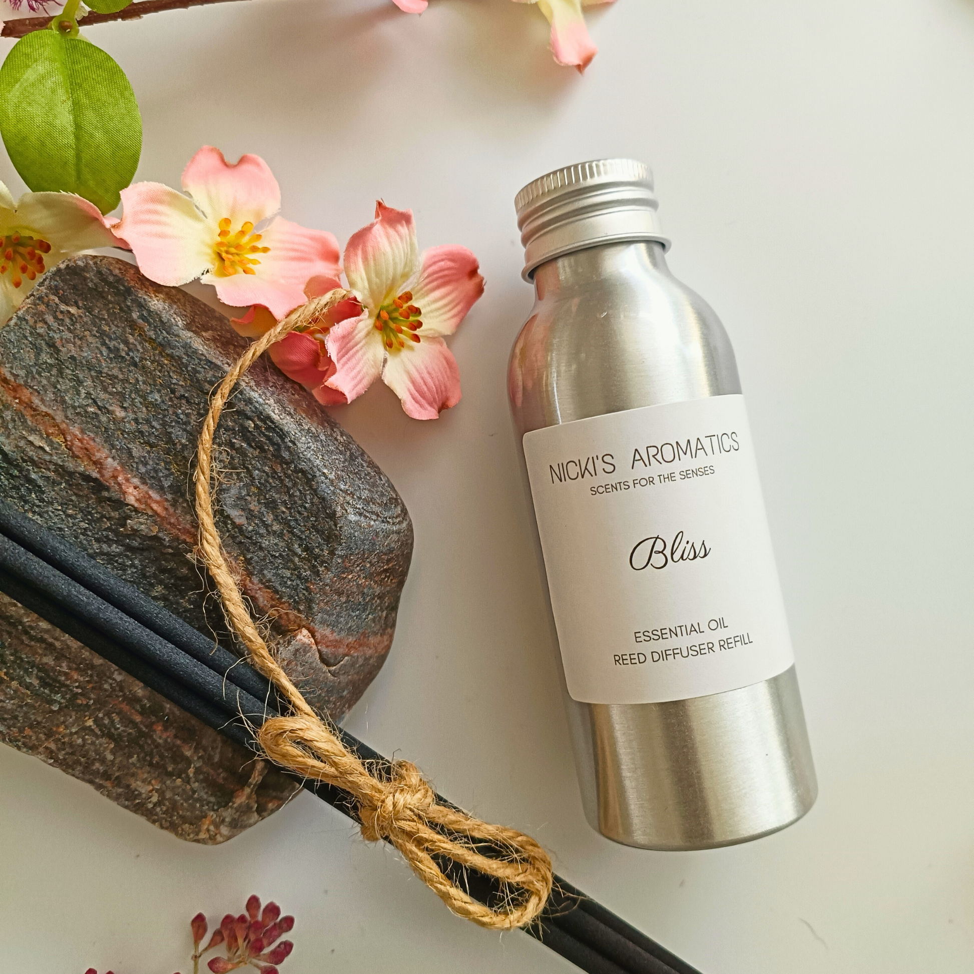 Bliss natural essential oil reed diffuser  refill in an aluminium bottle with black fibre reeds