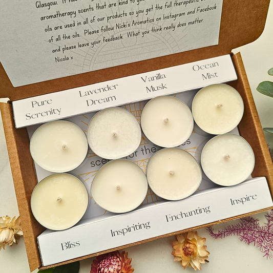 An open kraft box showing 8 clearly labelled chunky 4 hour tealights