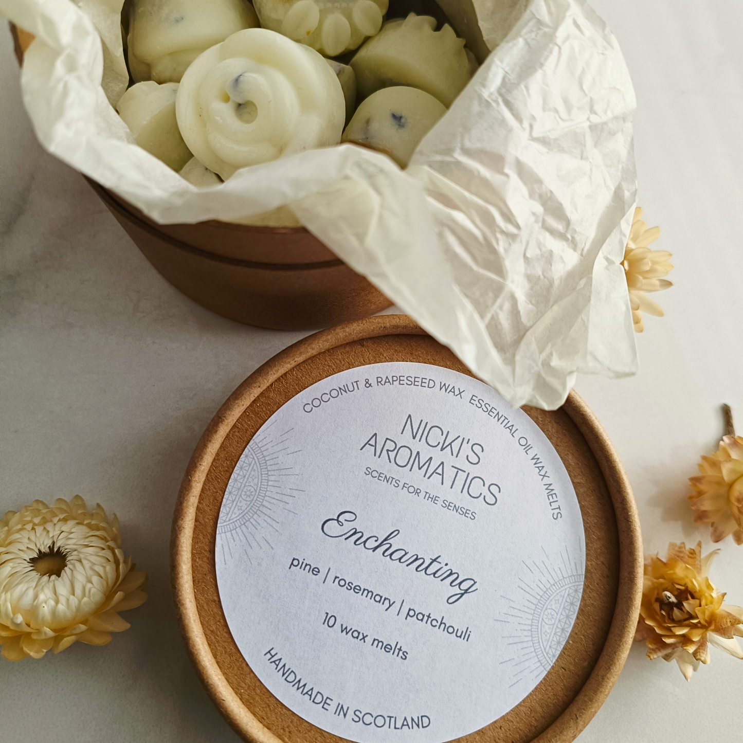 Enchanting essential oil wax melts in a kraft tub