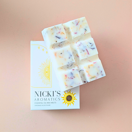 Gin Fizz essential oil wax melt bar with botanical details in Nicki’s Aromatics packaging