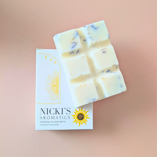Grounded Zen essential oil wax melt bar with botanical details in Nicki’s Aromatics packaging