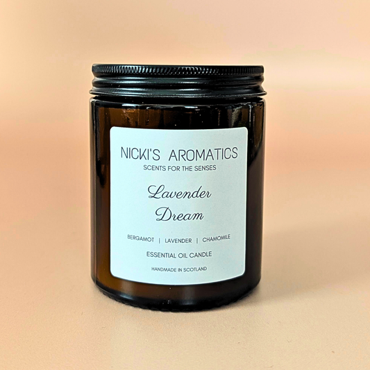 Lavender Dream essential oil candle with bergamot, lavender and chamomile in an amber glass jar
