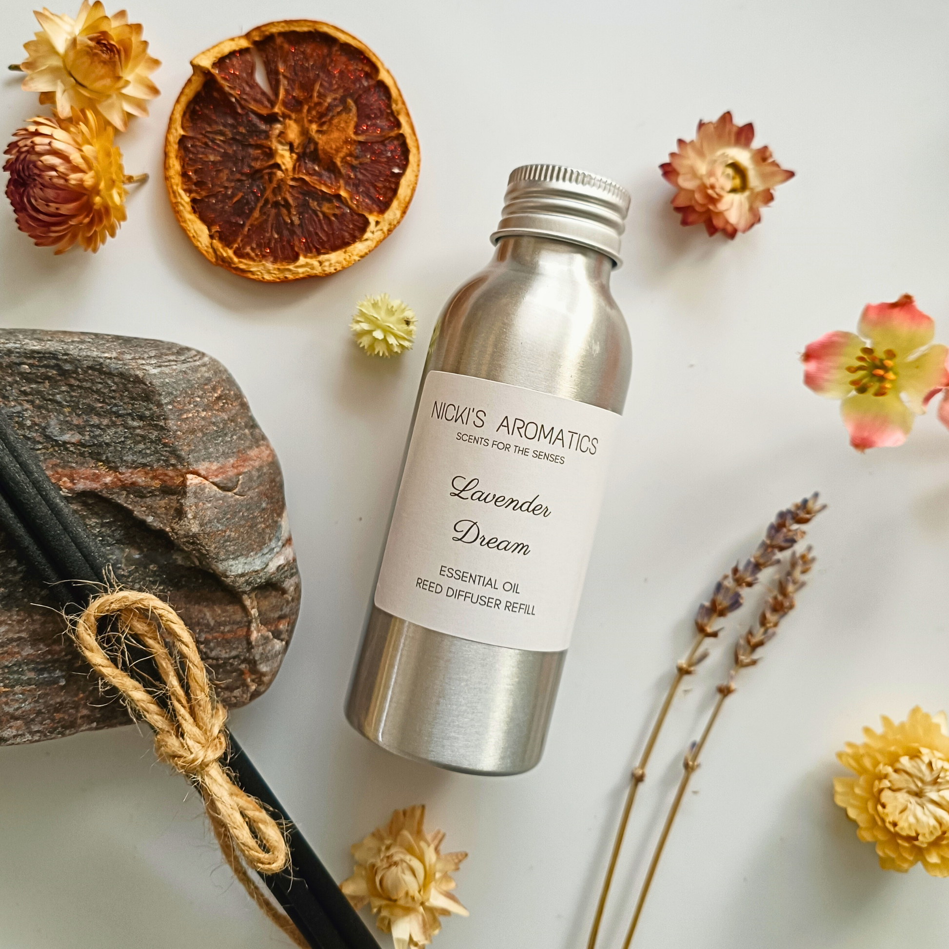 natural essential oil reed diffuser refill in an aluminium bottle
