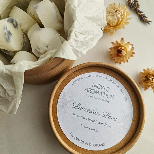 Lavender Love essential oil wax melts in an open kraft tube