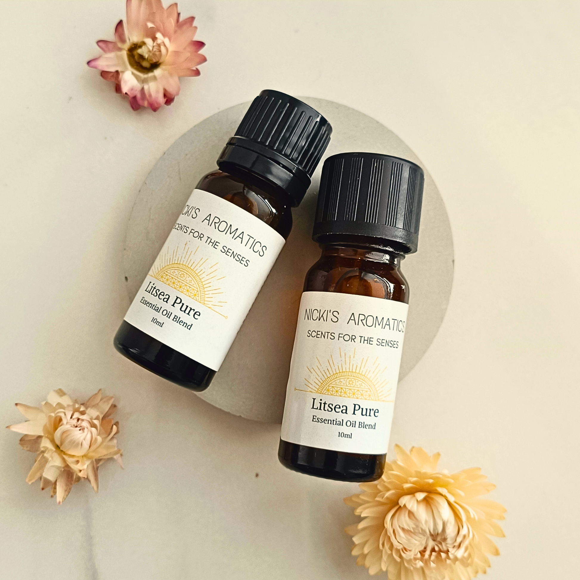Two 10ml amber glass bottle of Litsea Pure essential oil blend