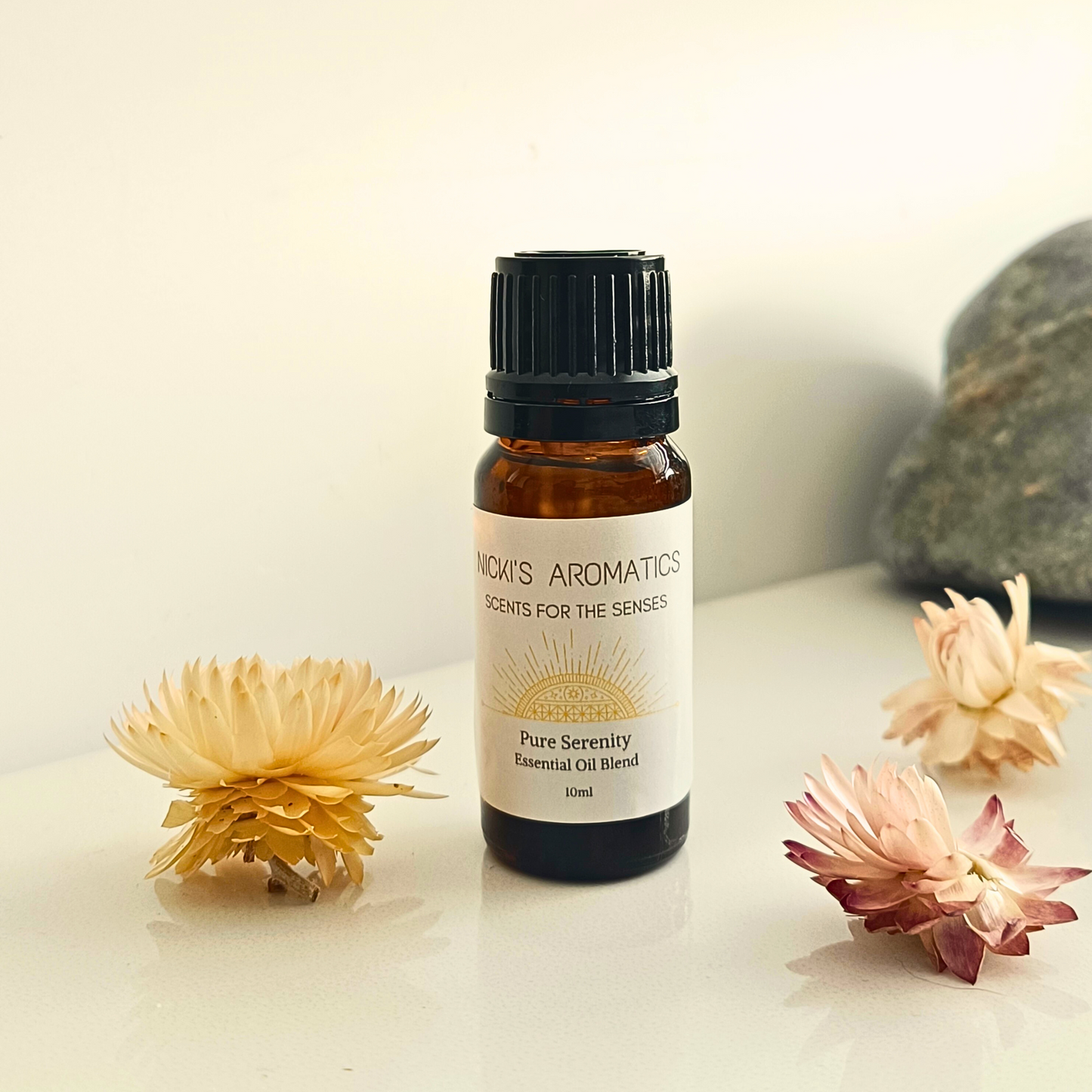 Pure Serenity essential oil blend in a 10ml amber glass bottle