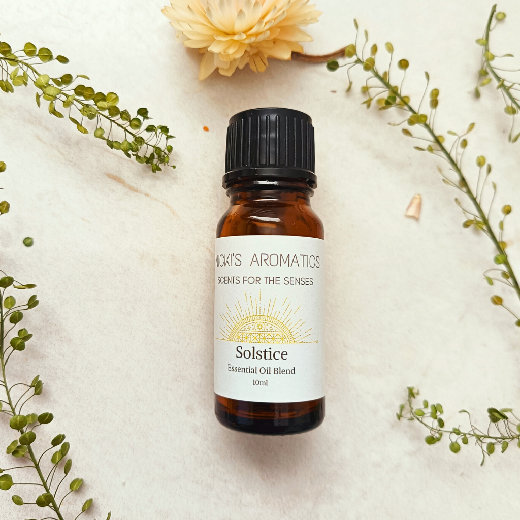 A 10ml amber glass bottle of Solstice lime basil and mandarin essential oil blend