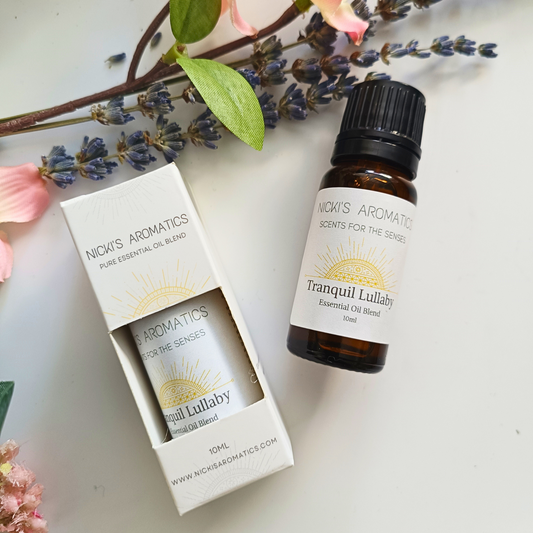 pure essential oil blend in an amber glass 10ml bottle  next to another in a box