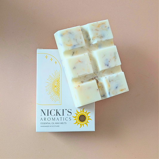 Zen essential oil wax melt bar with botanical details in Nicki’s Aromatics packaging