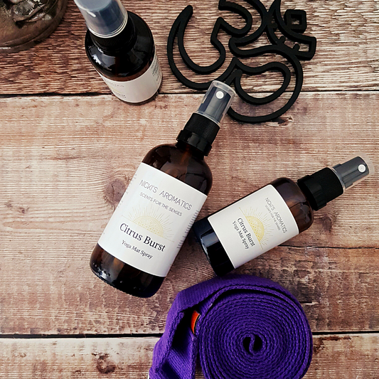 Essential oil yoga mat spray in a 100ml bottle and two 50ml bottles