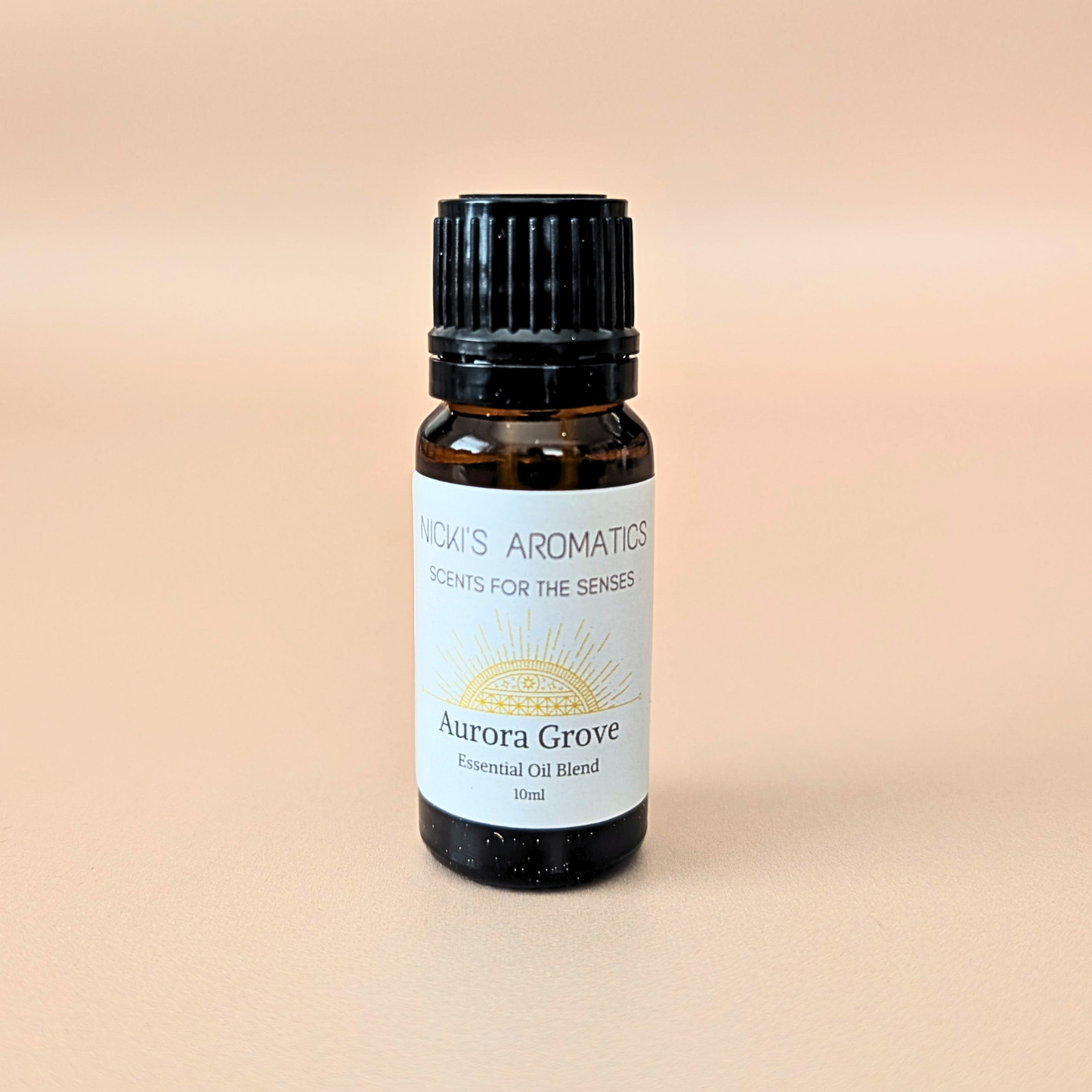 Aurora Grove pure essential oil blend with neroli, bergamot and vetiver in a 10ml amber glass bottle