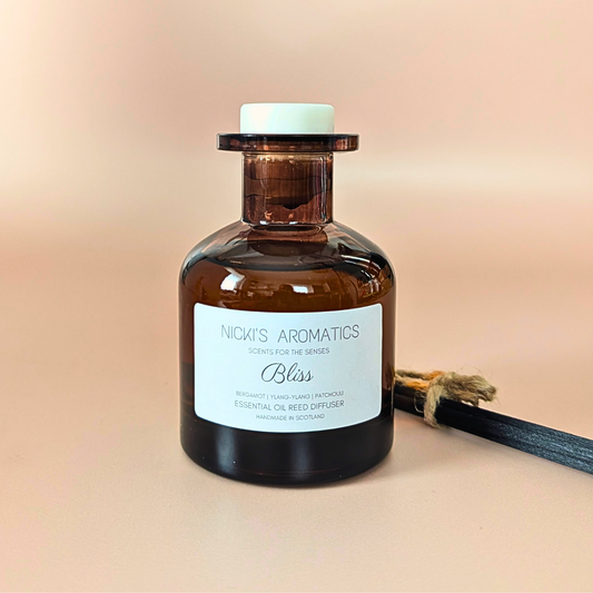 Bliss essential oil reed diffuser with bergamot, ylang-ylang and patchouli and black fibre reeds