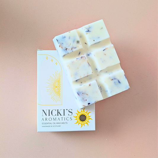 Fern Forest essential oil wax melt bar with botanical details in Nicki’s Aromatics packaging