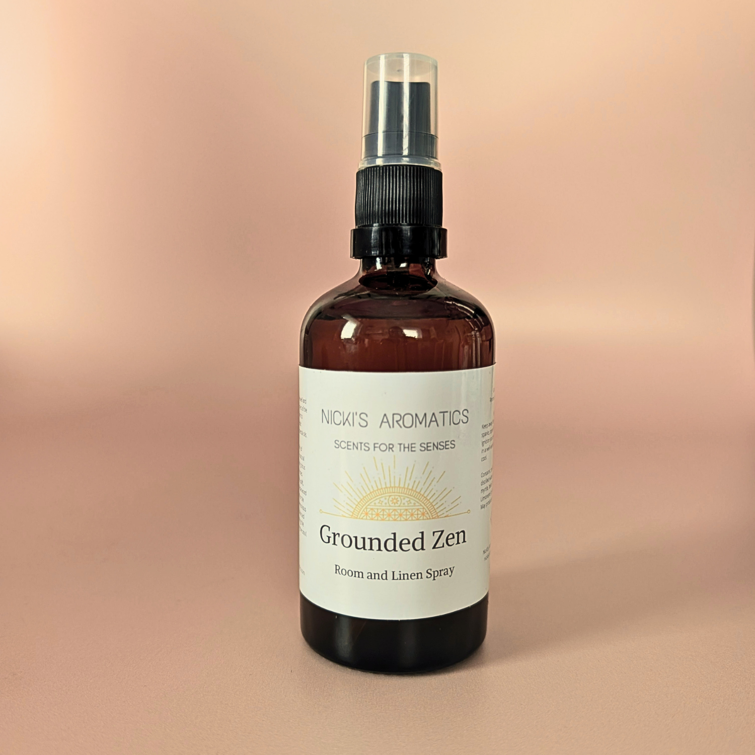 Grounded Zen natural room and linen spray with cedarwood and citrus in an amber glass bottle