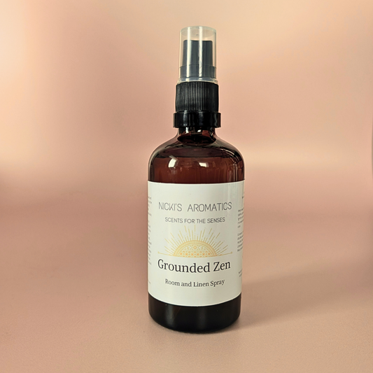 Grounded Zen natural room and linen spray with cedarwood and citrus in an amber glass bottle