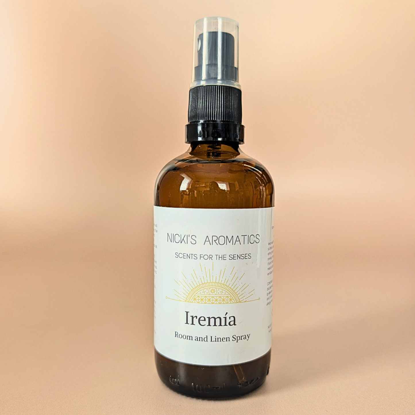 Iremia natural room and linen spray with lemongrass, grapefruit and rosewood in an amber glass bottle