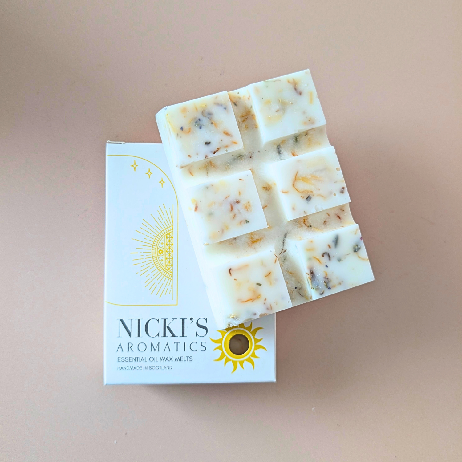 Lavender Dream essential oil wax melt bar with botanical details in Nicki’s Aromatics packaging