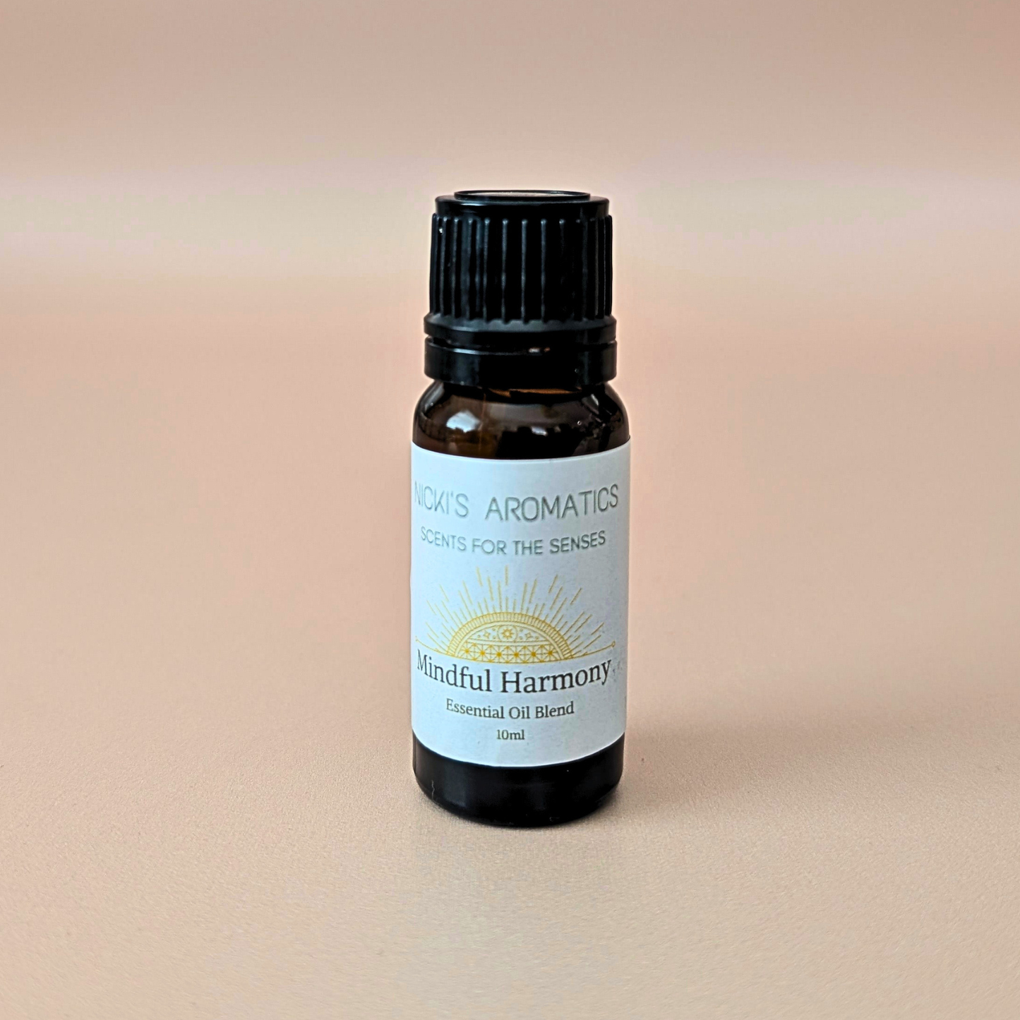Mindful Harmony pure essential oil blend with lemongrass, grapefruit and sandalwood in a 10ml amber glass bottle