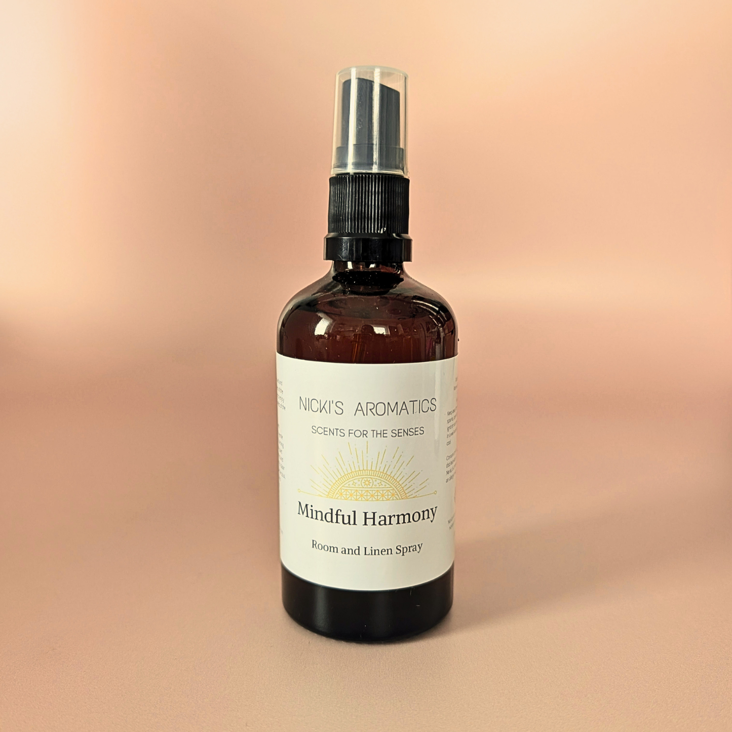 Mindful Harmony natural room and linen spray with lemongrass, sandalwood and cedarwood in an amber glass bottle