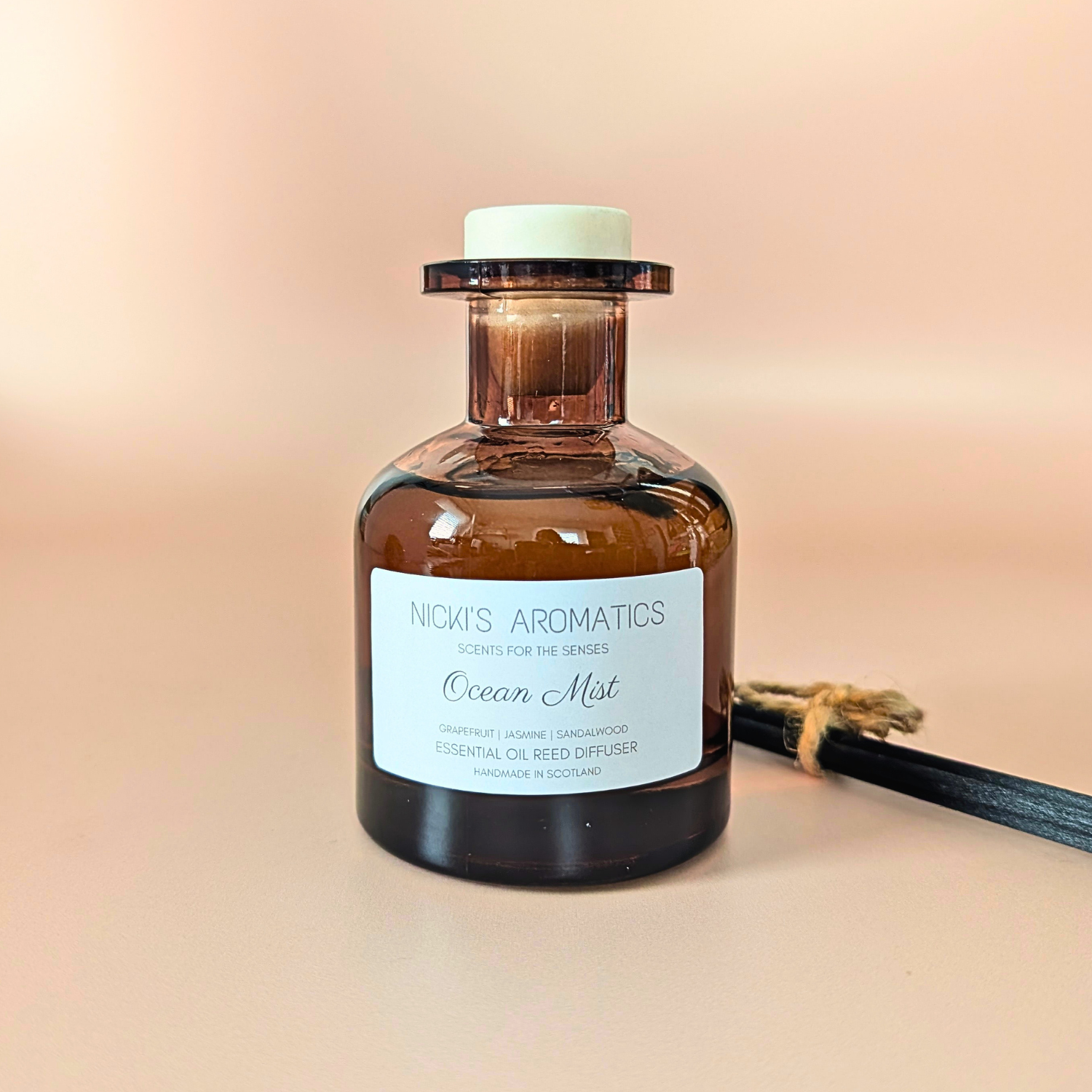 Ocean Mist essential oil reed diffuser with grapefruit, jasmine and sandalwood and black fibre reeds