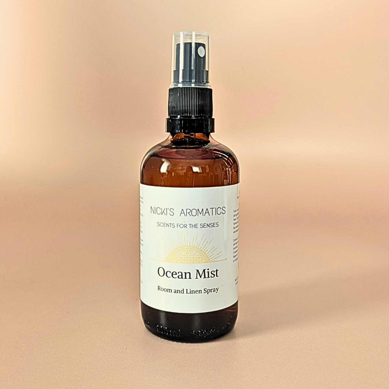 Ocean Mist natural room and linen spray with grapefruit, bergamot and jasmine in an amber glass bottle