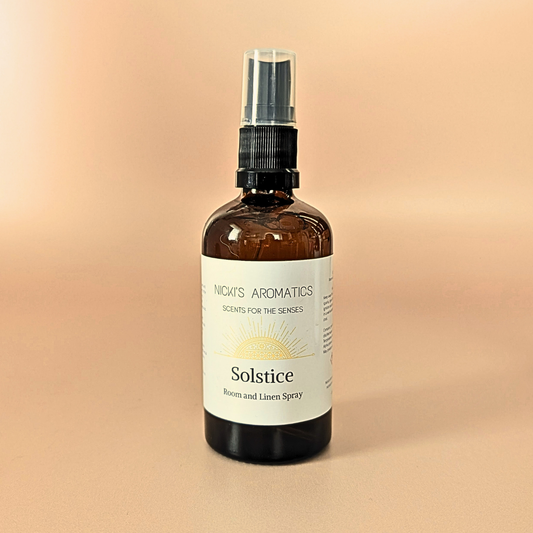 Solstice natural room and linen spray with lime, mandarin and basi in an amber glass bottle