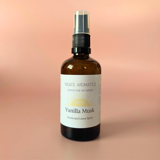 Vanilla Musk natural room and linen spray with black pepper, juniper and neroli in an amber glass bottle
