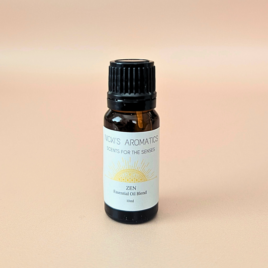 Zen pure essential oil blend with citrus and patchouli in a 10ml amber glass bottle